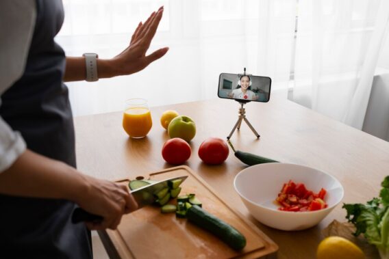 female chef having videocall while cooking 23 2150789795